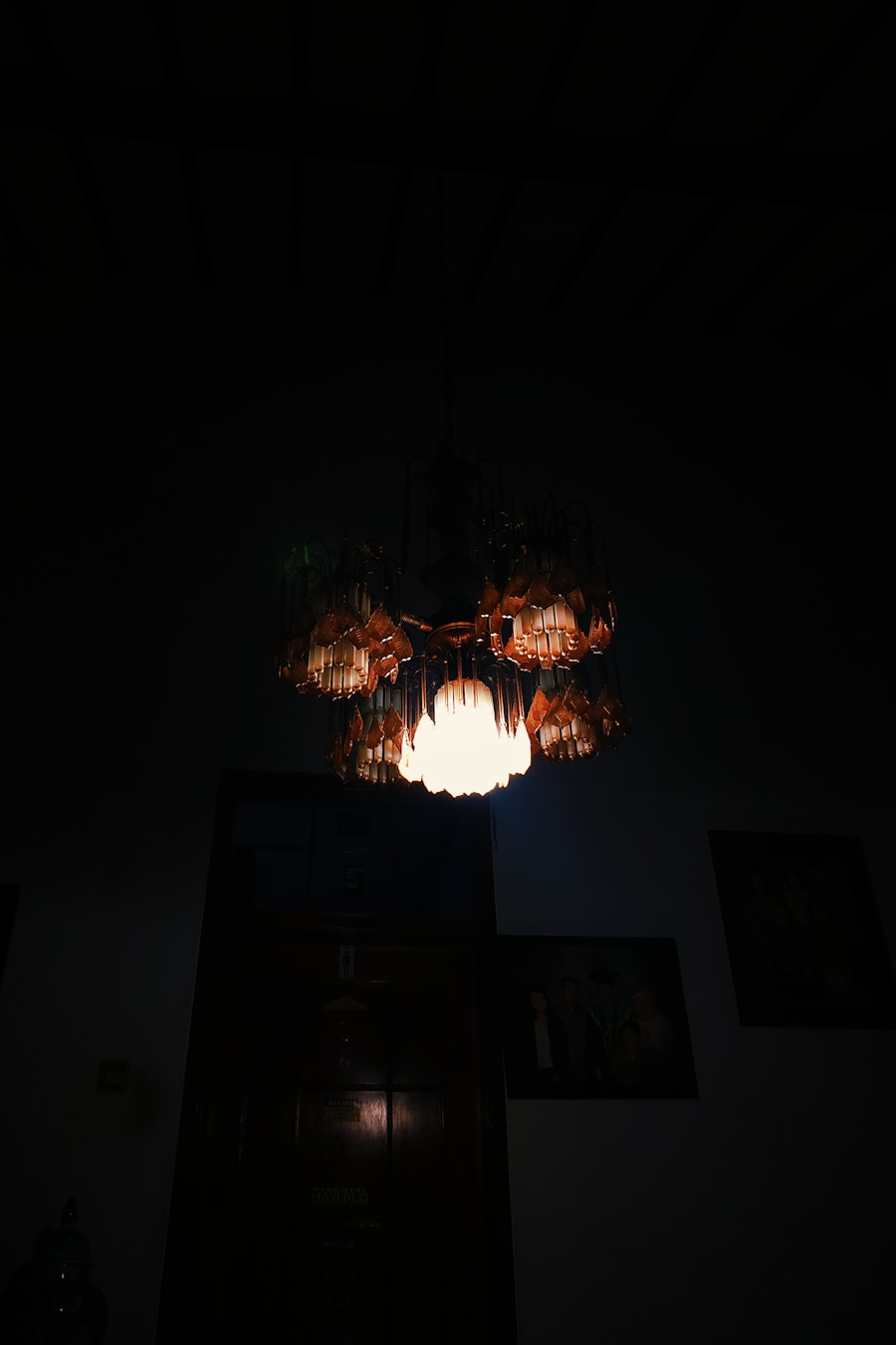 Photo "Retro wooden chandelier in bedroom"